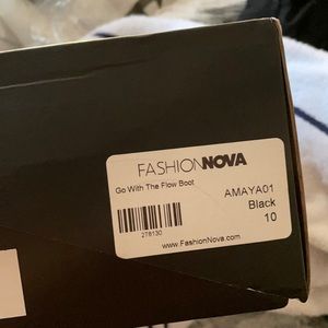 Thigh high heeled boot